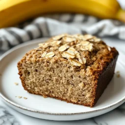 A plated slice of banana oat bread from homemade Zepbound recipes on a white ceramic dish